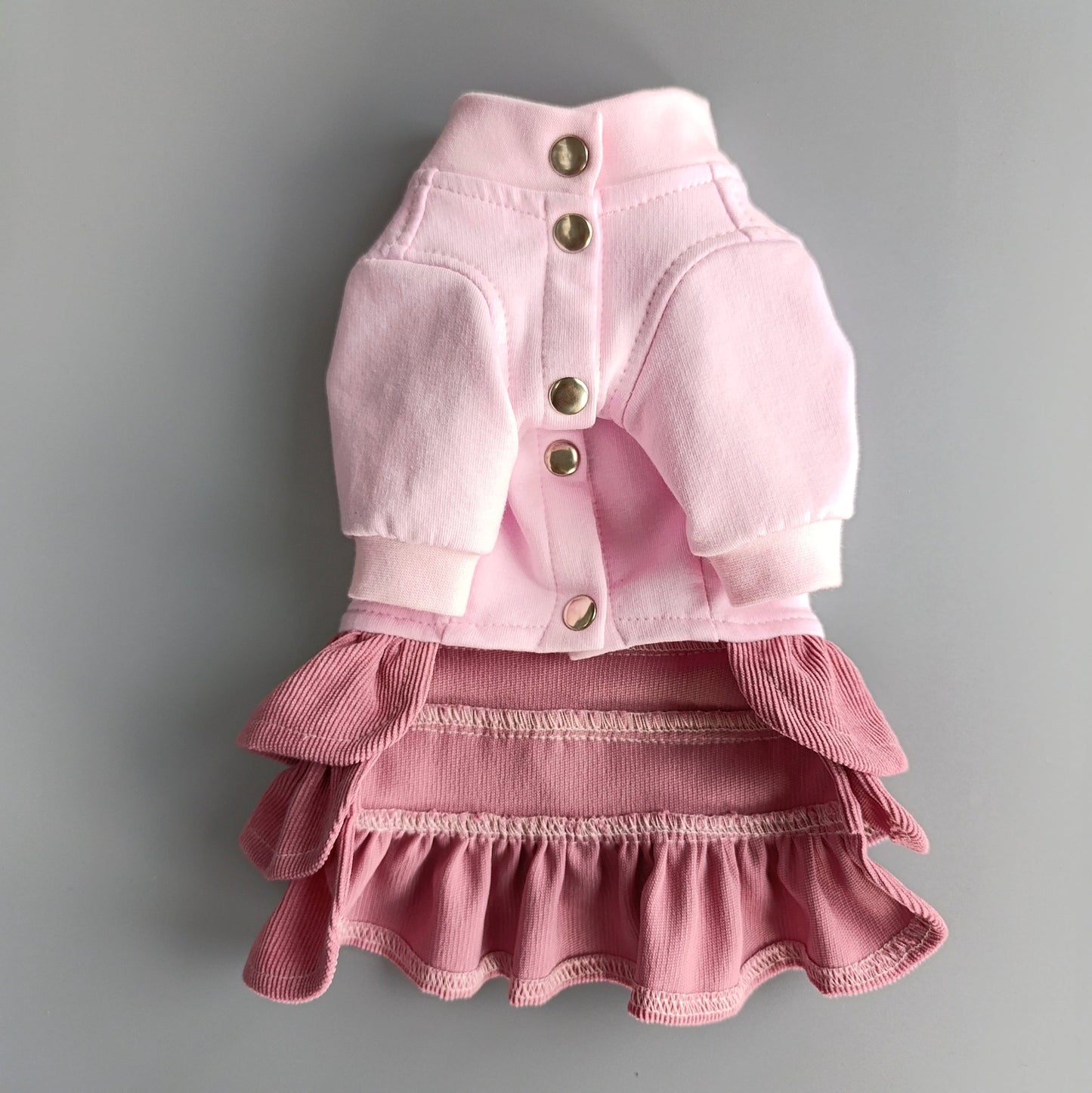 Pink dog coat with ruffled skirt