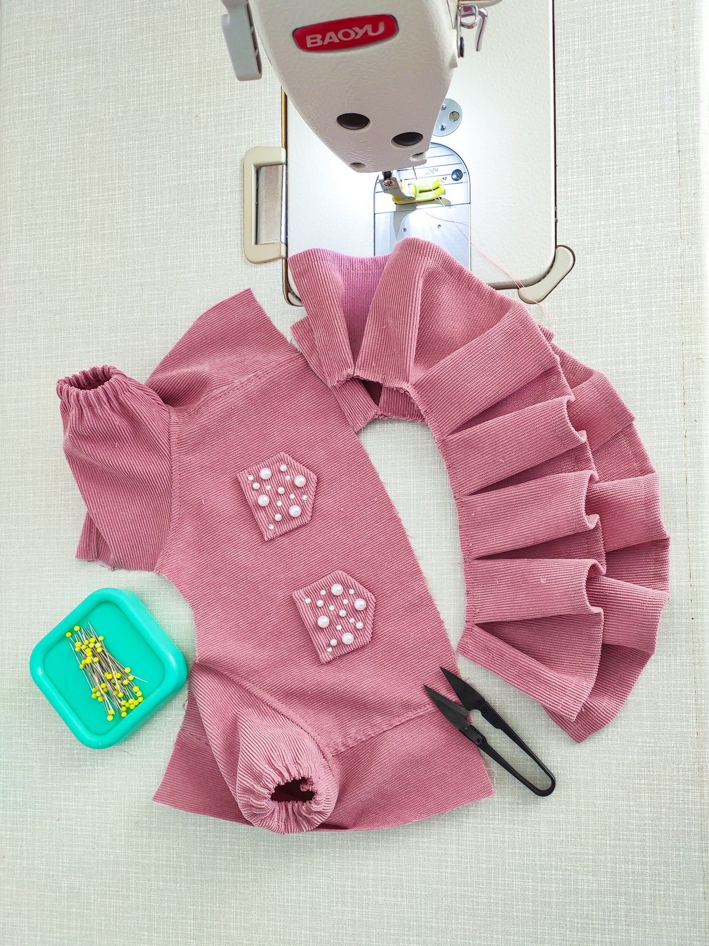 Pink cute dog dress. Designer pet fashion clothes